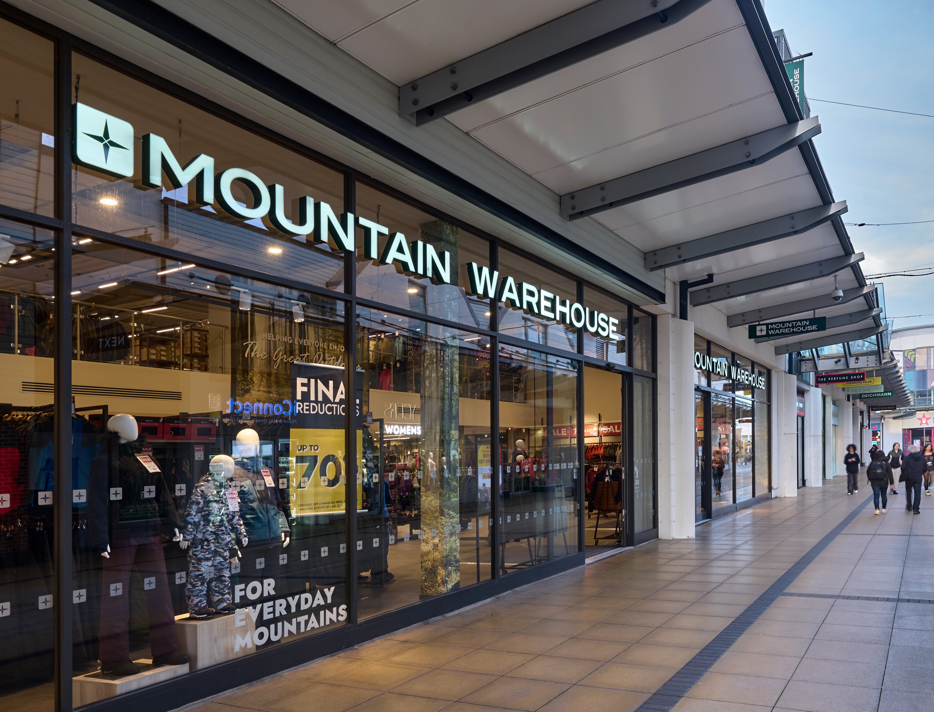 The exterior sign of a Mountain Warehouse store in Westwood Cross