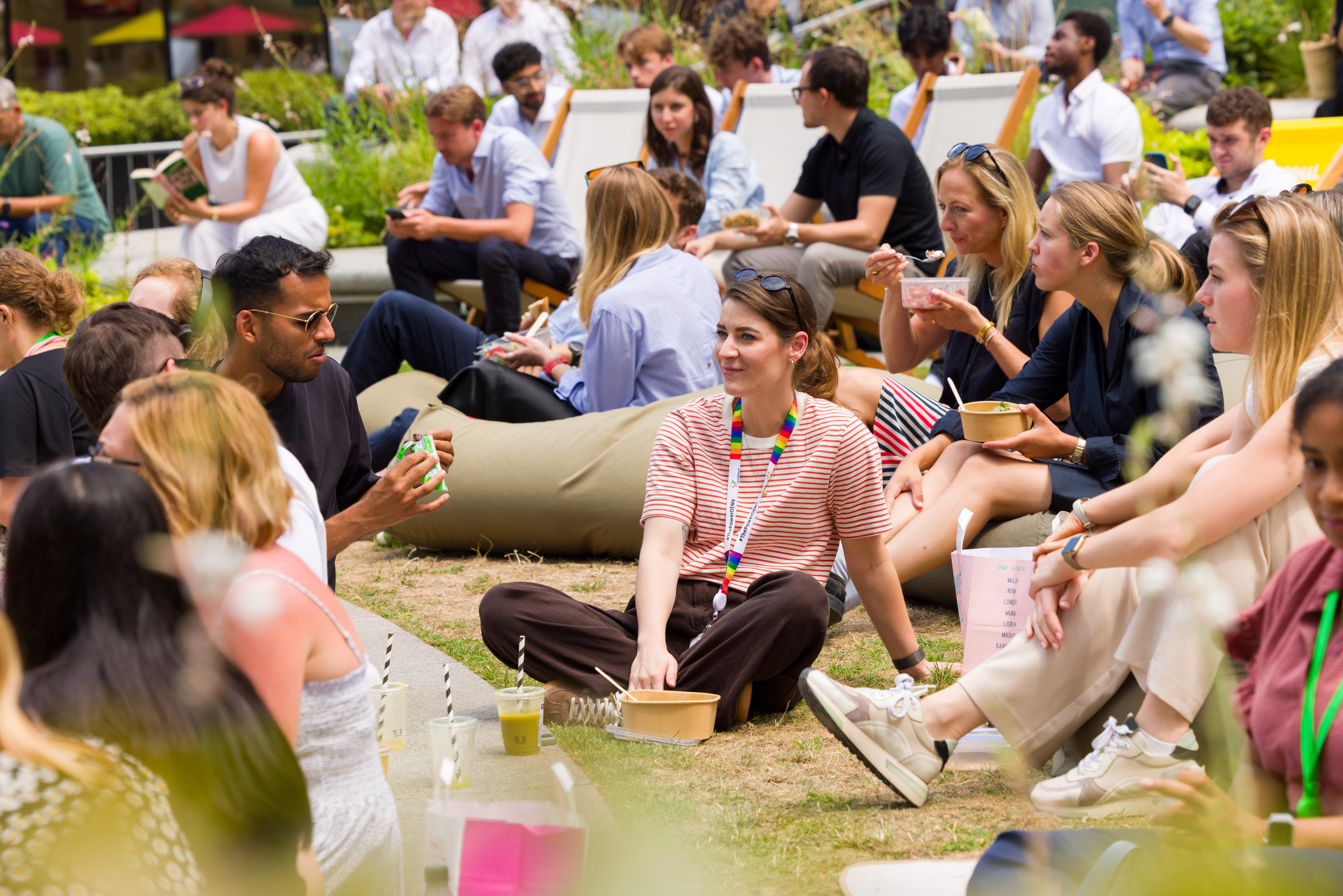 People enjoying the sunshine in The Garden 