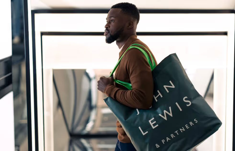 Man with John Lewis shopping bag - My John Lewis