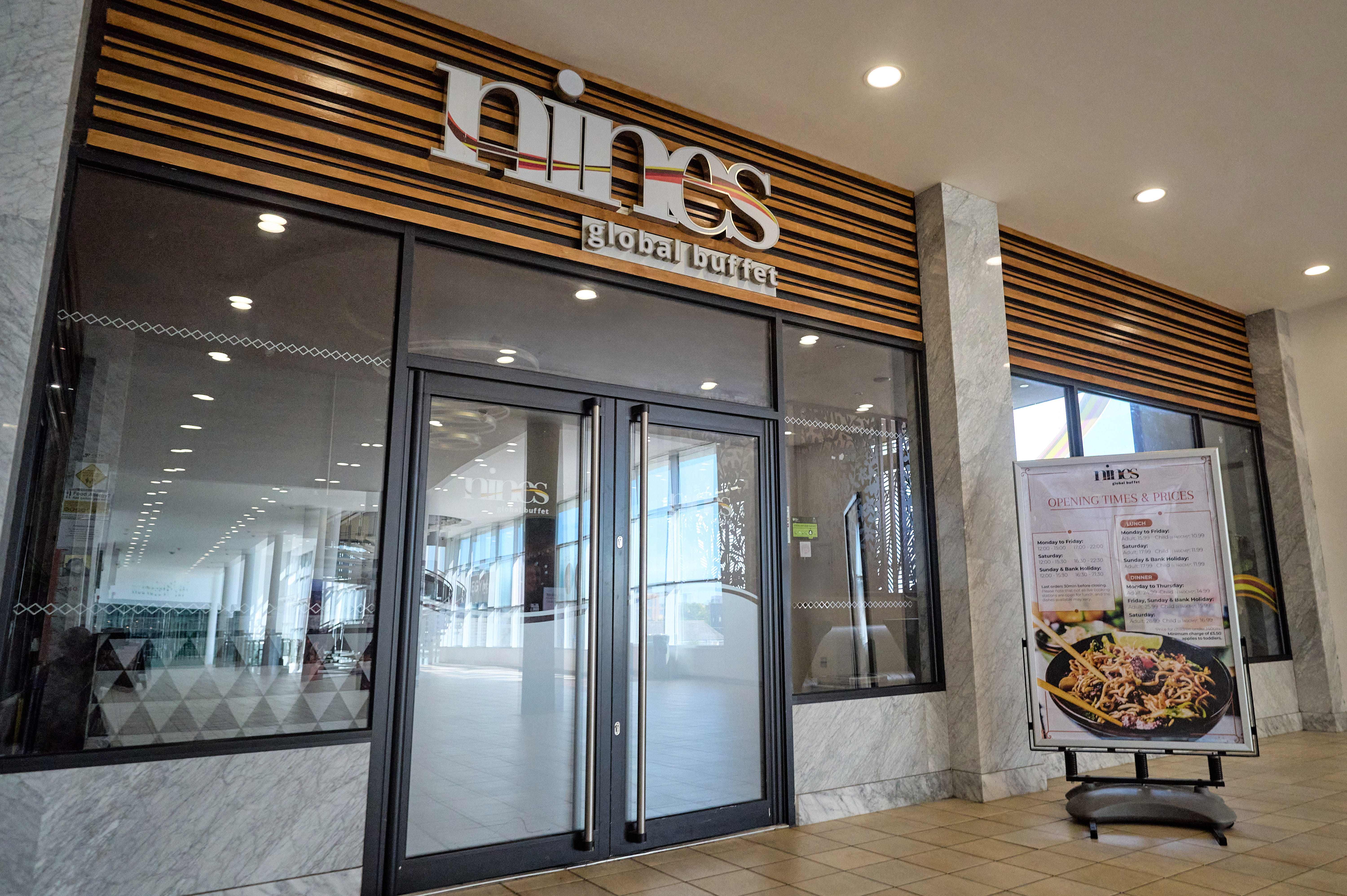 Nines global buffet signage front shop