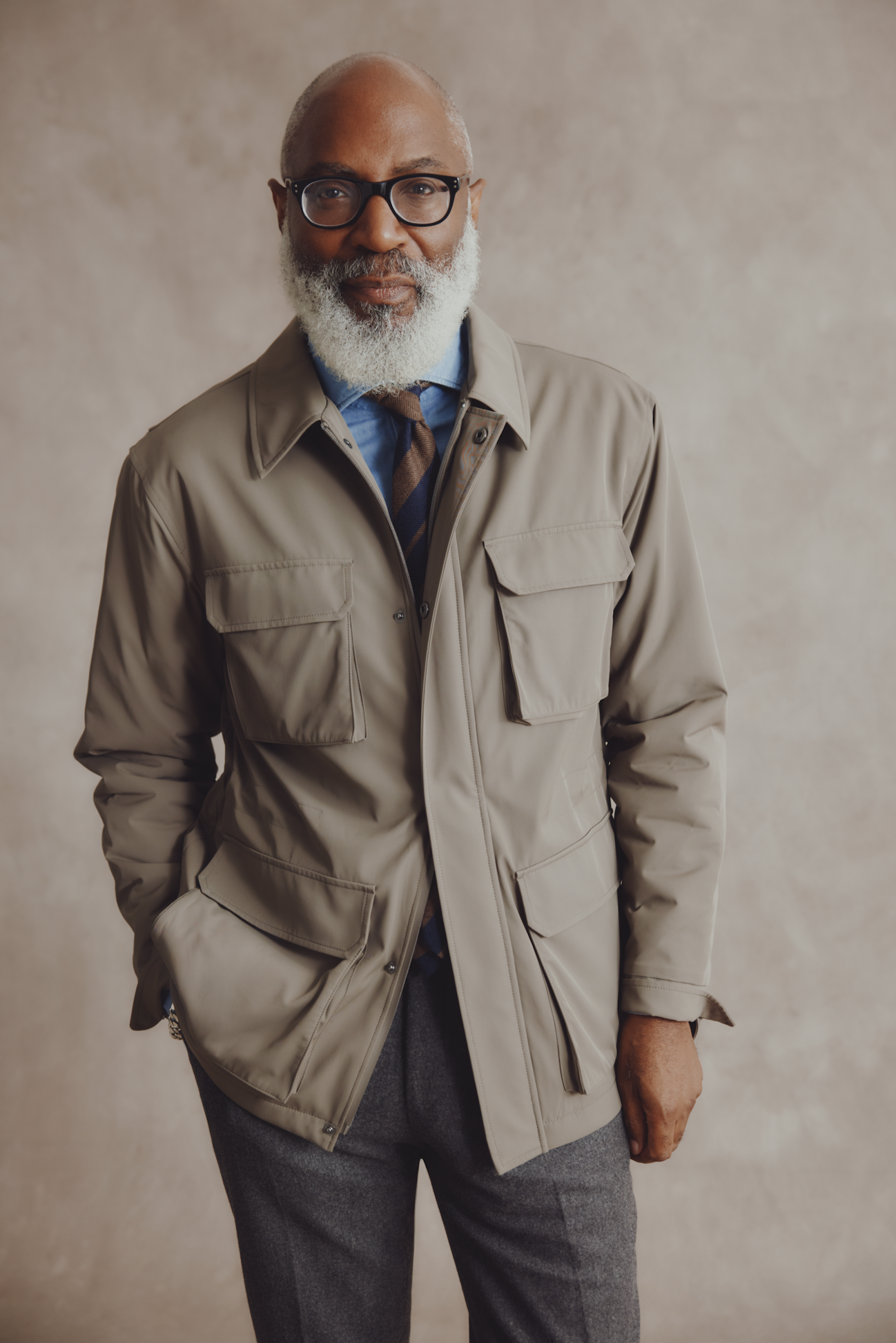 A man wearing a smart khaki jacket