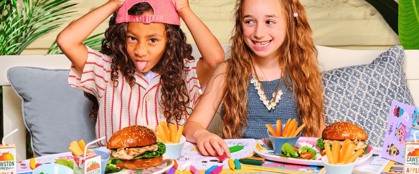 Two girls eating at Bill's