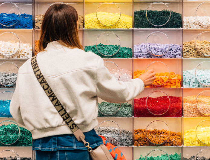 Woman in front of LEGO display
