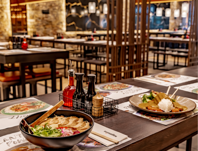 Wagamamas dishes and restaurant interior at Parrs Wood