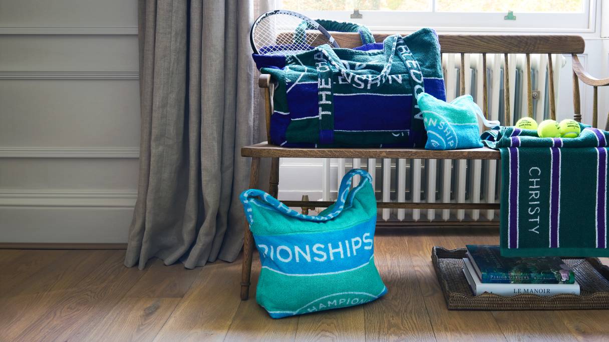 A collection of Christy Wimbledon bags in a home setting