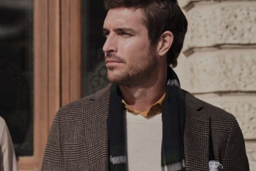 Man dressed in Hackett blazer and scarf