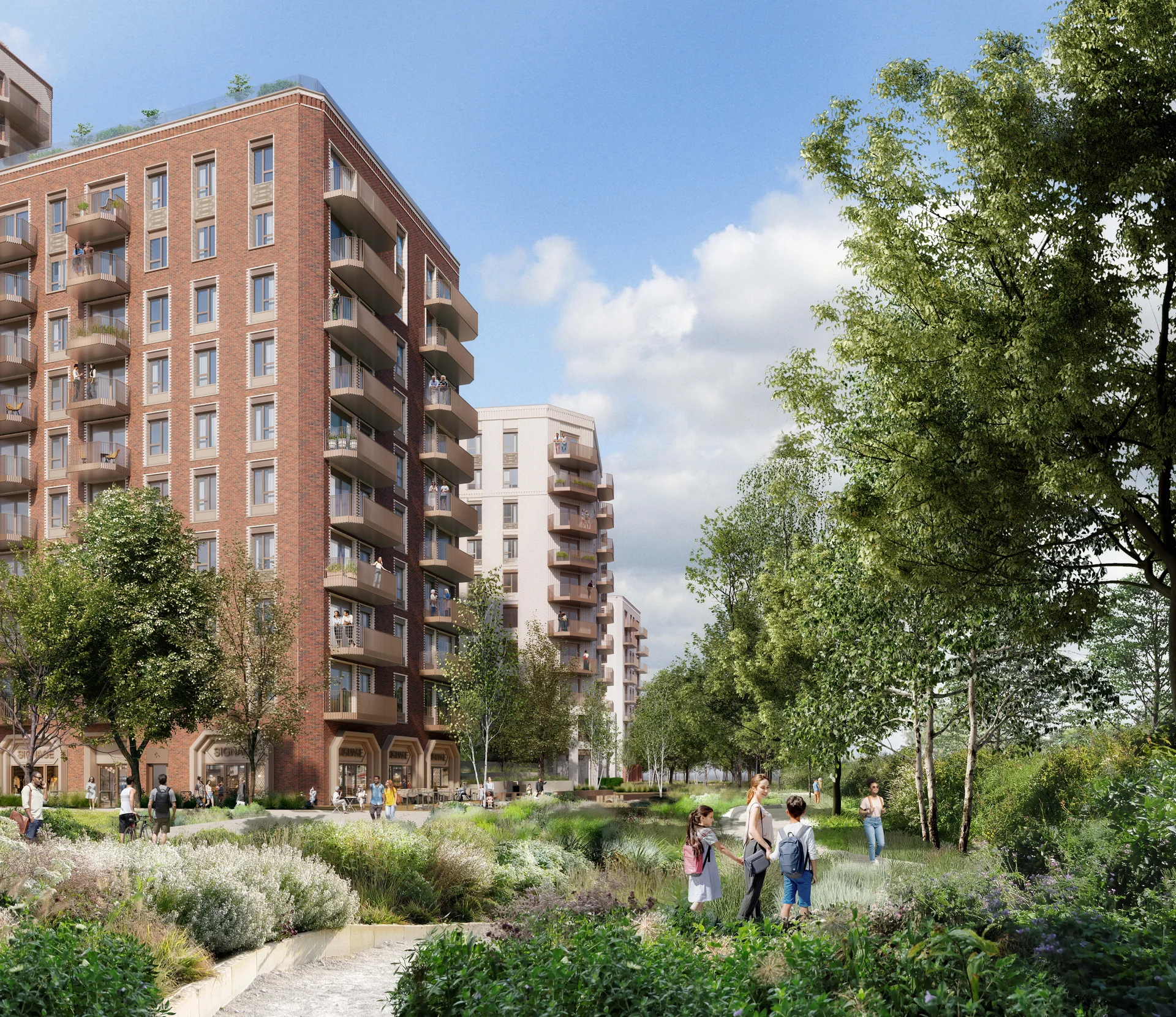 O2 Finchley Road apartment buildings. View along a treelined path and biodiverse planting leading to the new housing blocks.
