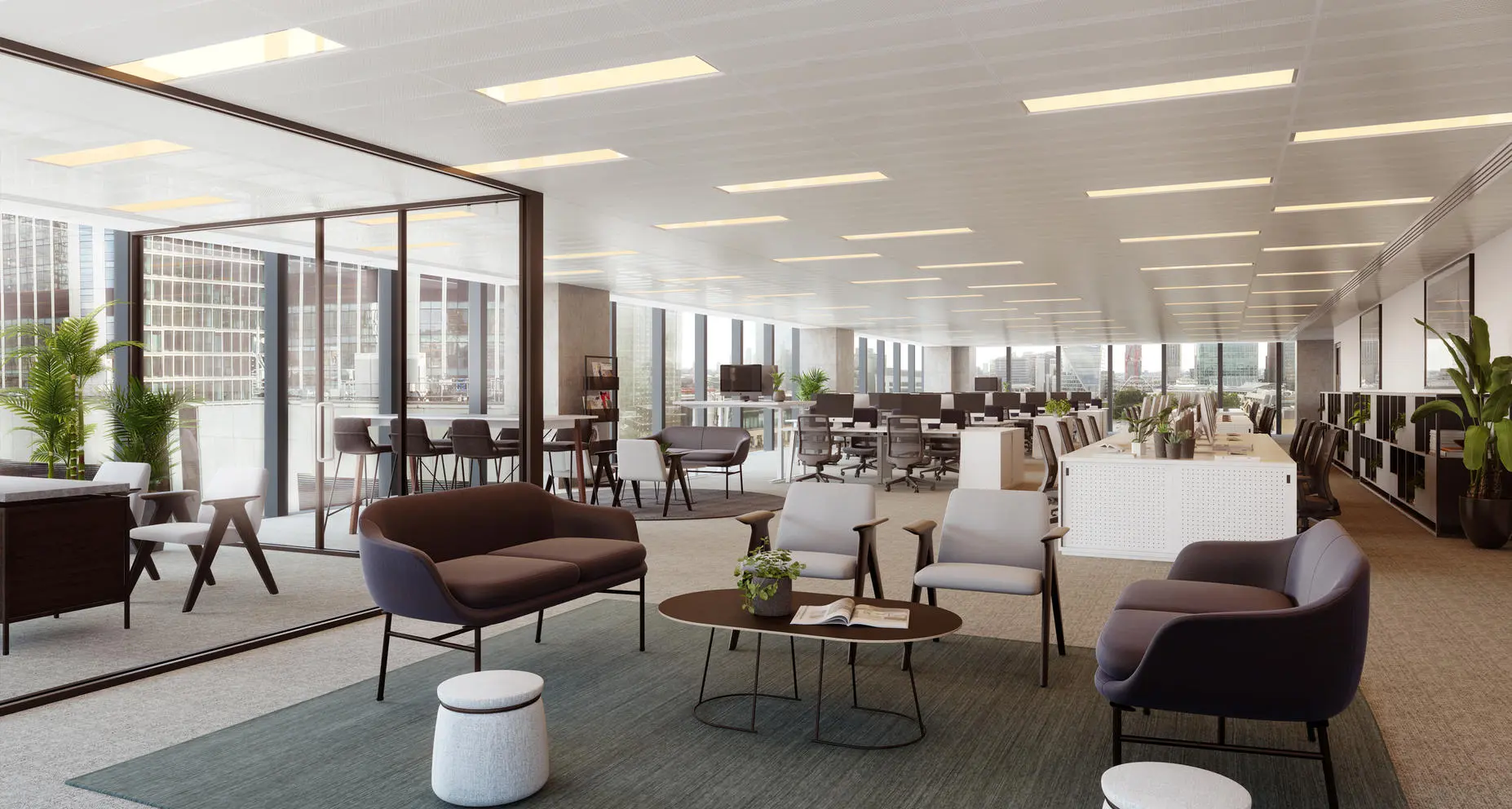 Modern office seating area with sofas, chairs, and workstations in the background.