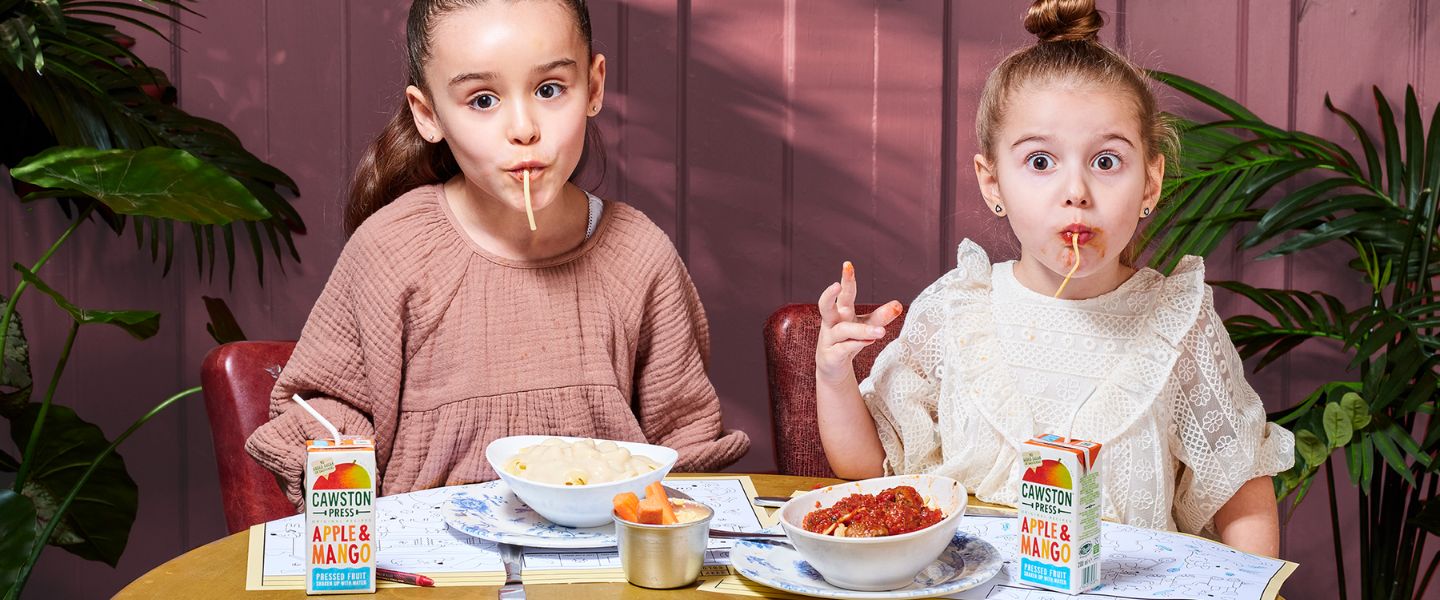 Two girls eating at Bill's