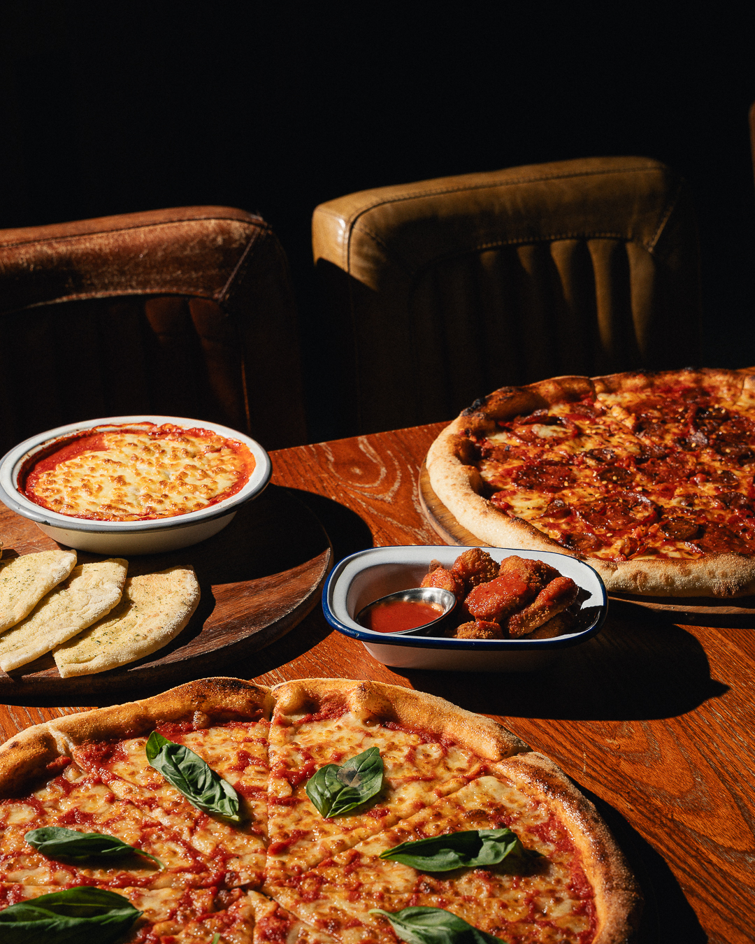 Cheesy pizzas at Gordon Ramsay Street Pizza