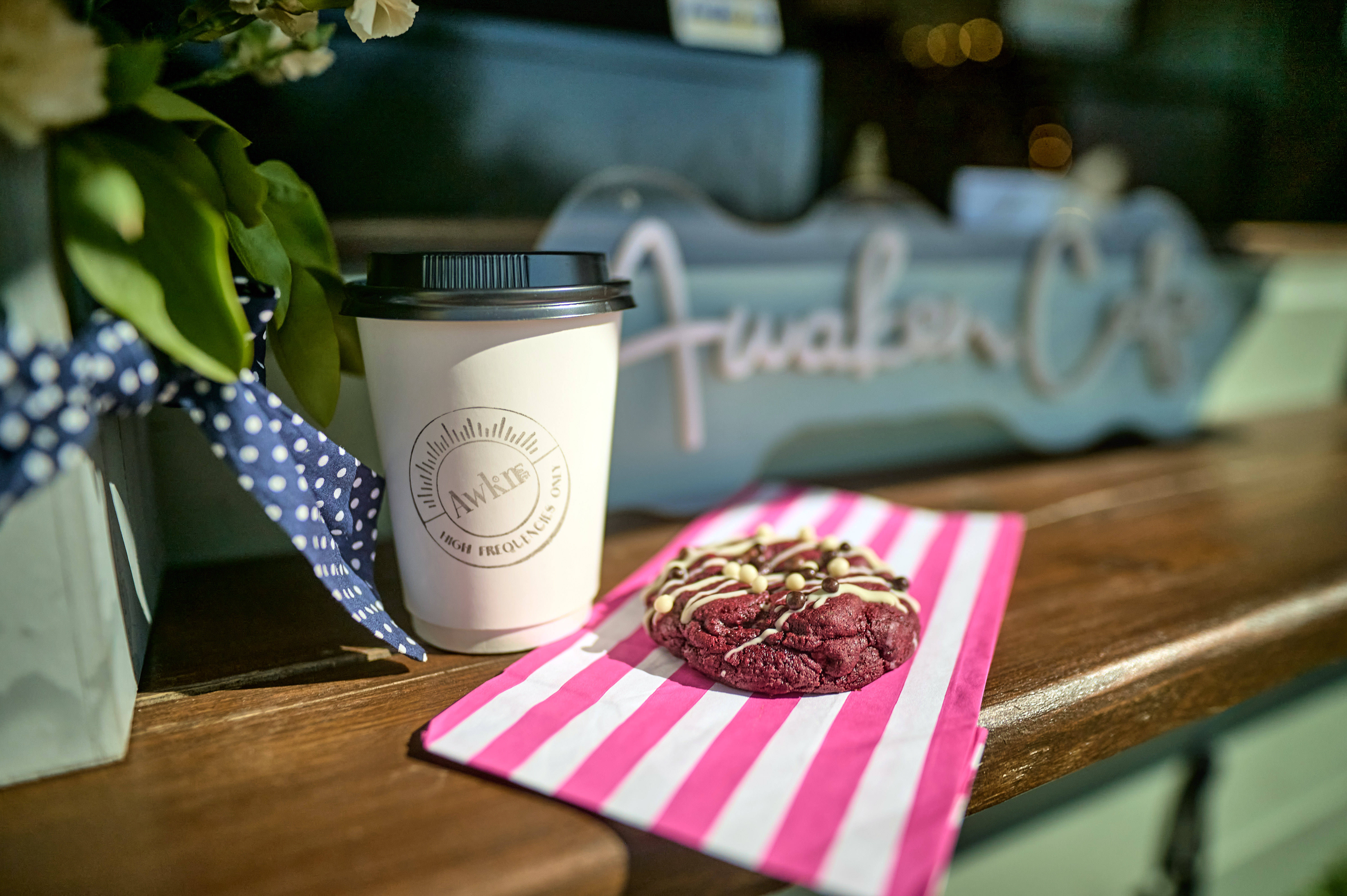 A coffee and a cookie from Awaken Cafe