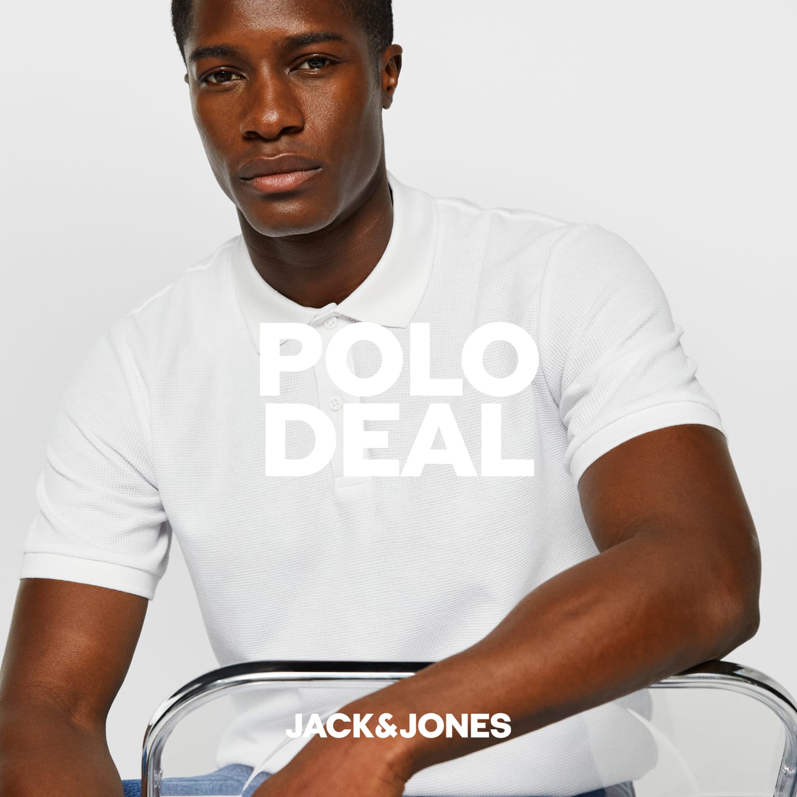 A man in a white T shirt advertising 'polo deal' in block white text