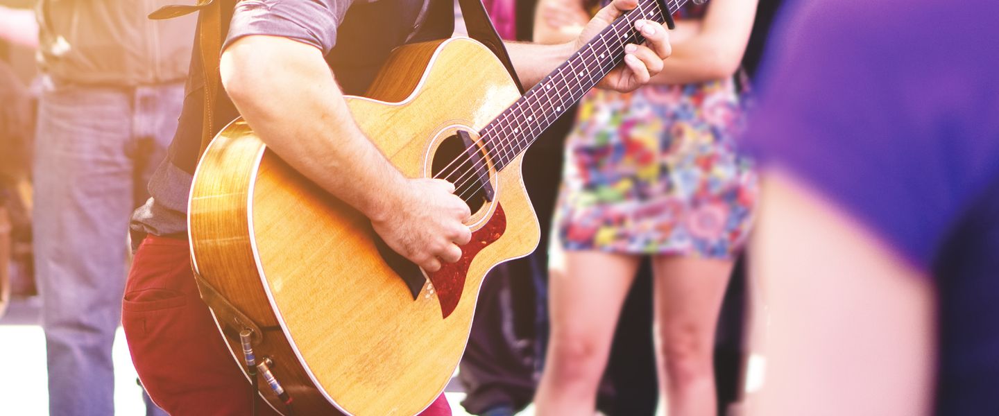 A man playing a guitar