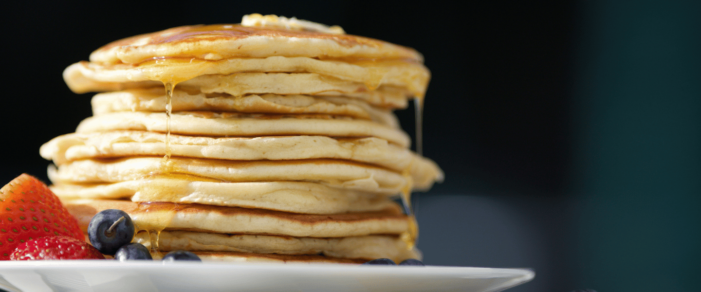 A stack of pancakes on a plate