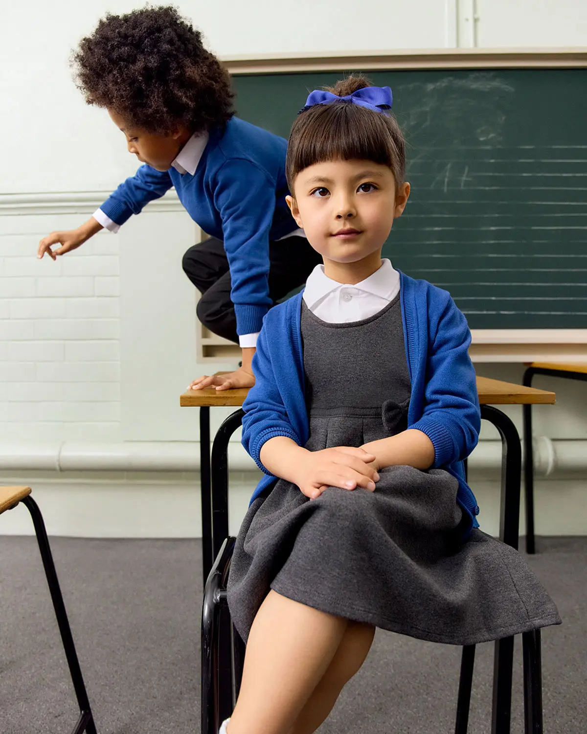 Two school children in a classroom