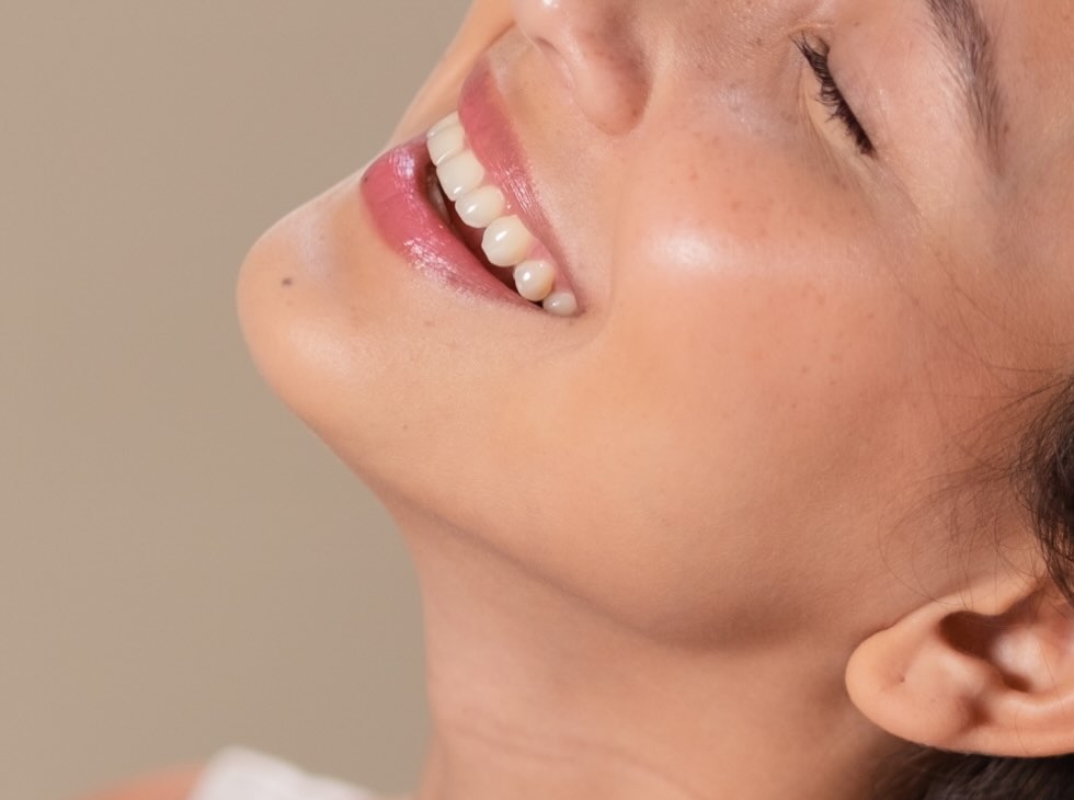 Close up of a woman's face, showing clear and healthy skin