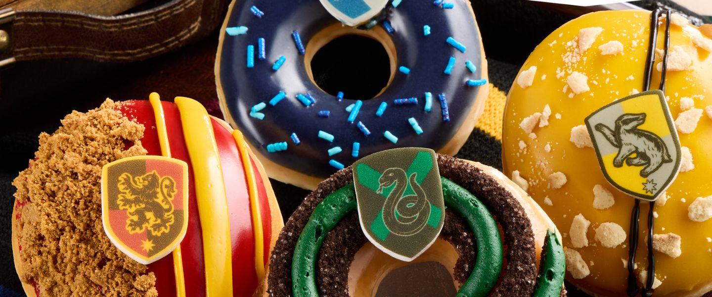 Krispy Kreme doughnuts with Harry Potter house crests and coloured icing