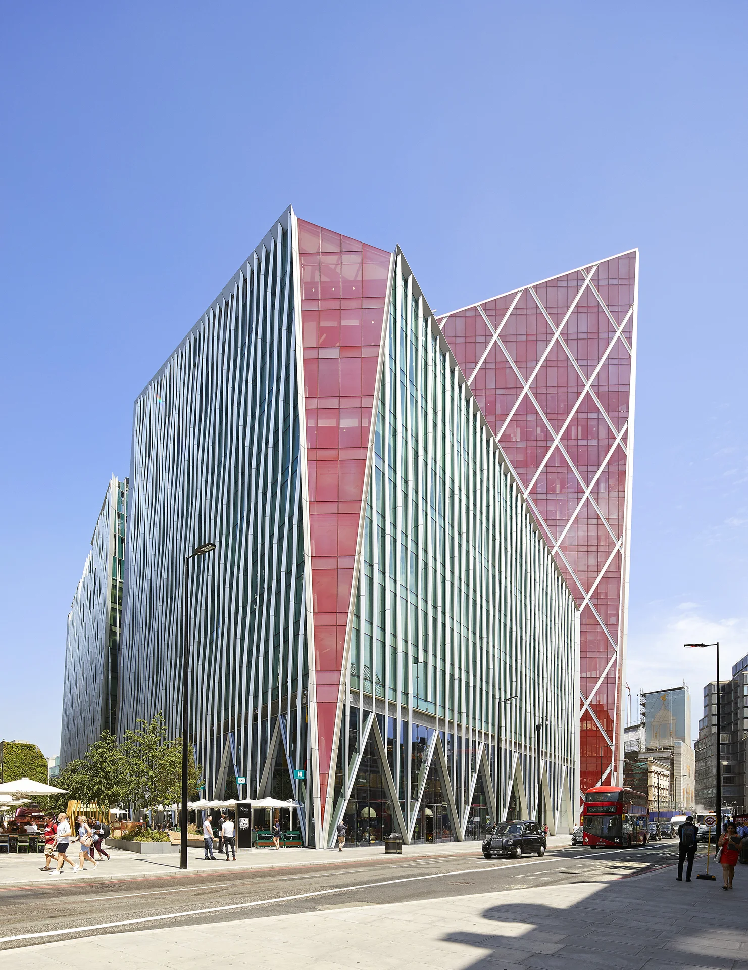 Distinctive angular glass buildings of Nova development in Victoria on a sunny day (1)