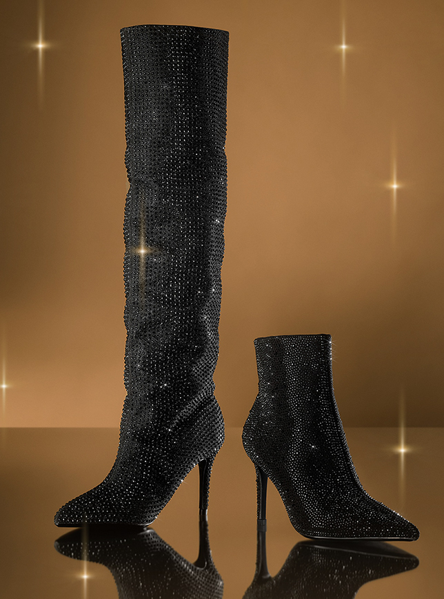 One knee-length sparkly boot and one sparkly ankle boot