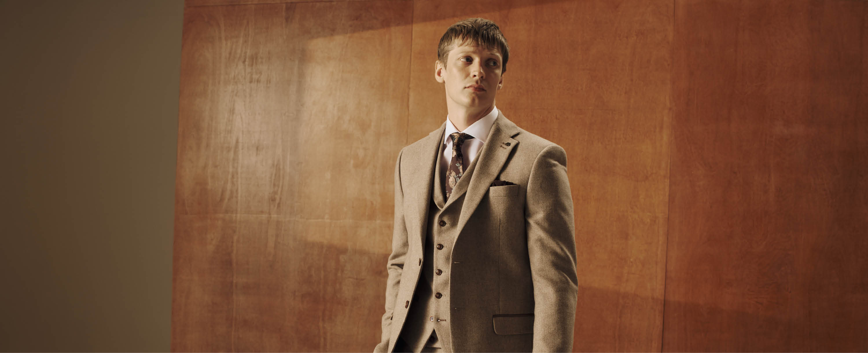  A model wearing a three piece suit