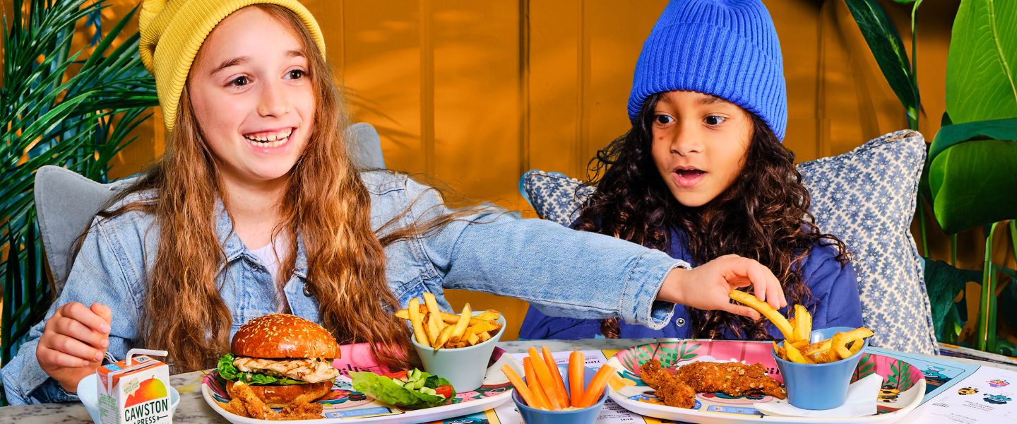 Two girls eating at Bill's