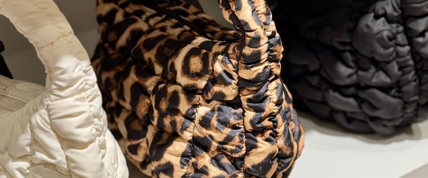 A cream, leopard print, and black textured bag from COS