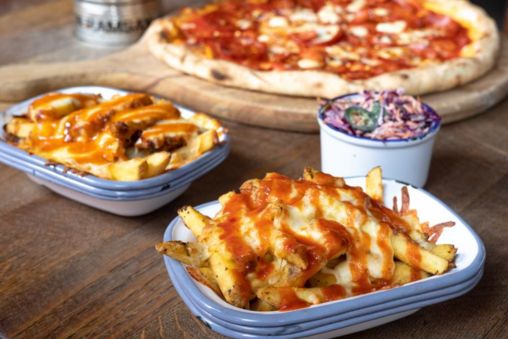 Cheesy pizza and loaded fries at Gordon Ramsay Street Pizza