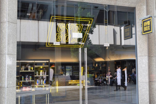 The glass exterior of Gymbox At Victoria London