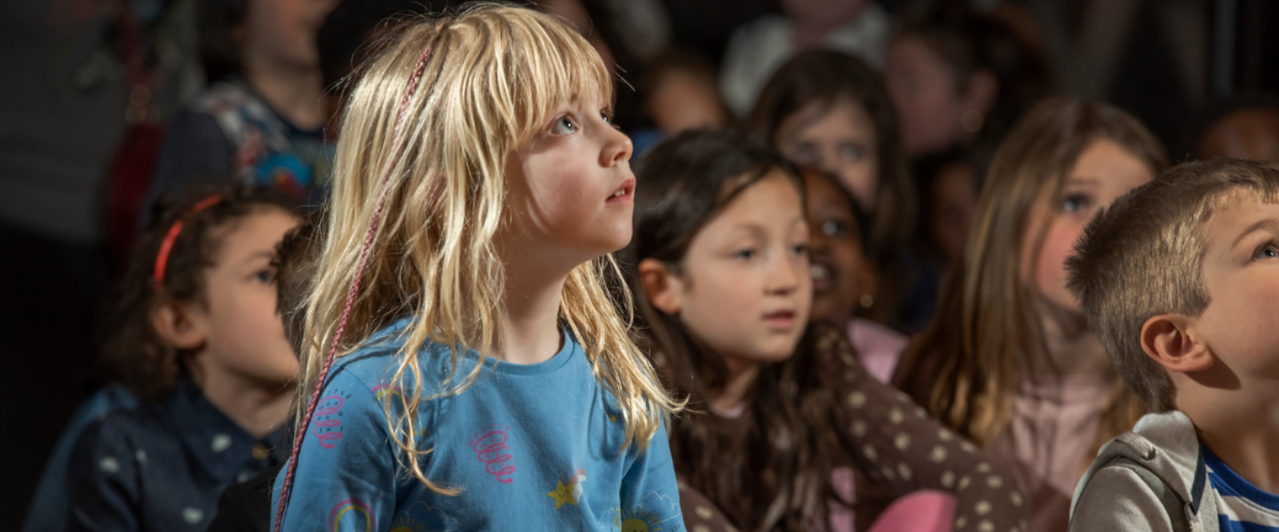 Children listening at an events at London Museum Docklands