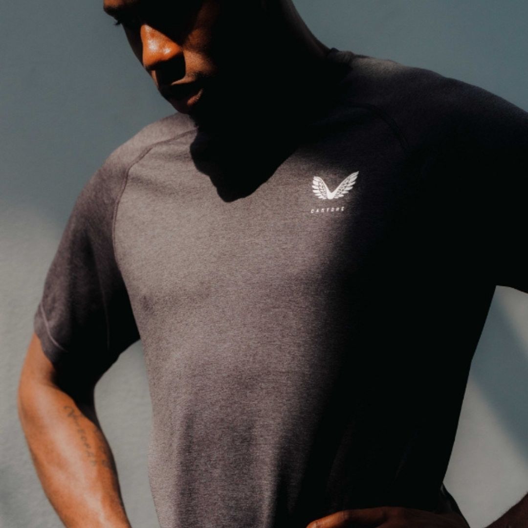 A male model wearing Castore training gear