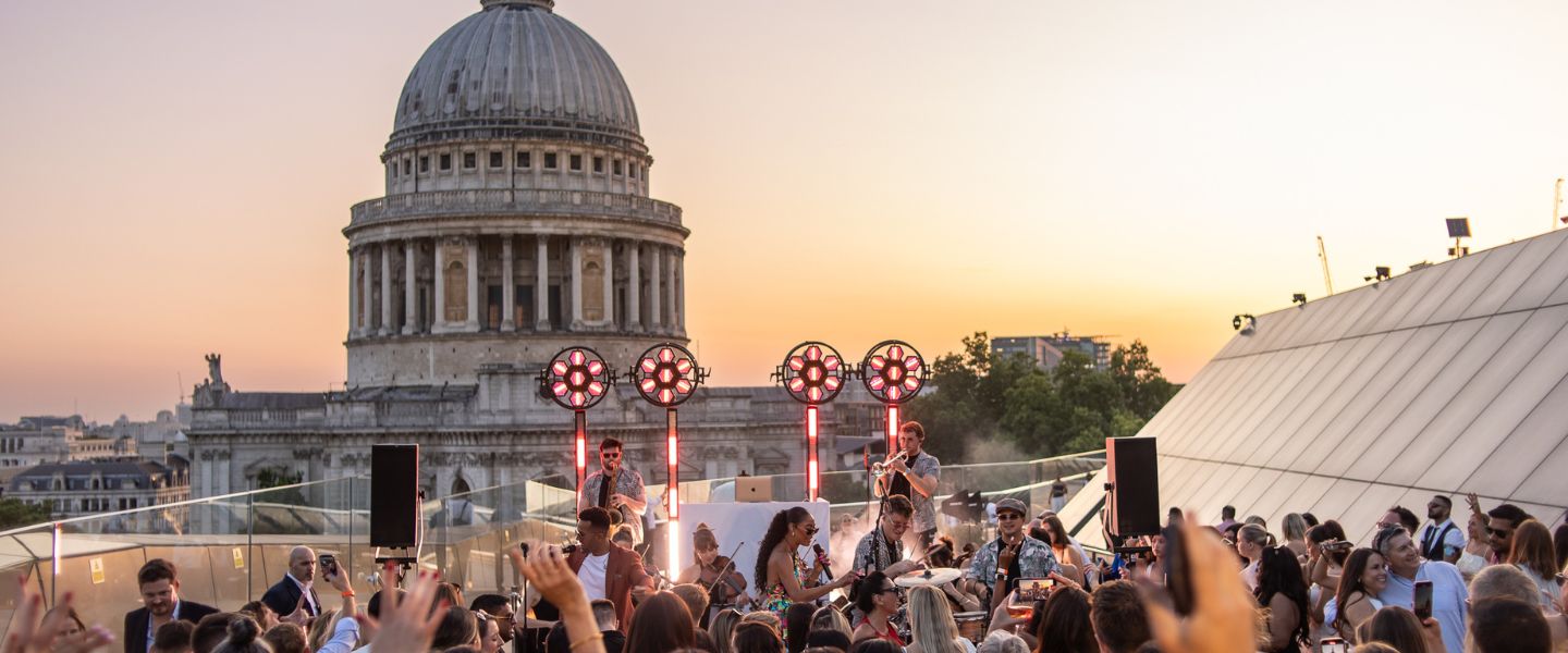 The crowd watching Ibiza Orchestra on the Madison rooftop